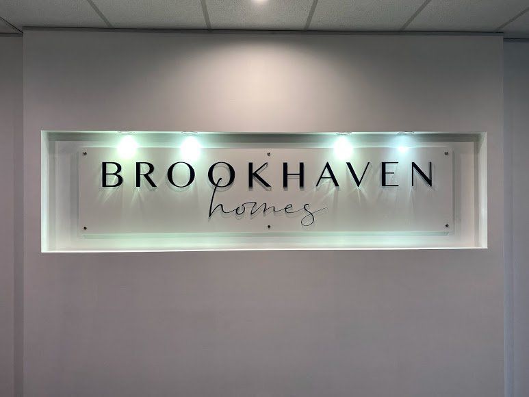 Logo With Light On Top — Signage In Acacia Ridge, QLD