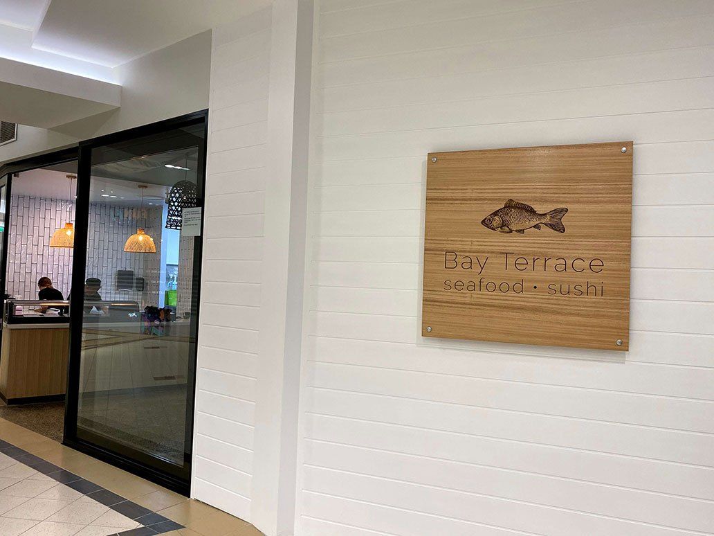 Timber Signage On White Wall — Signage In Acacia Ridge, QLD