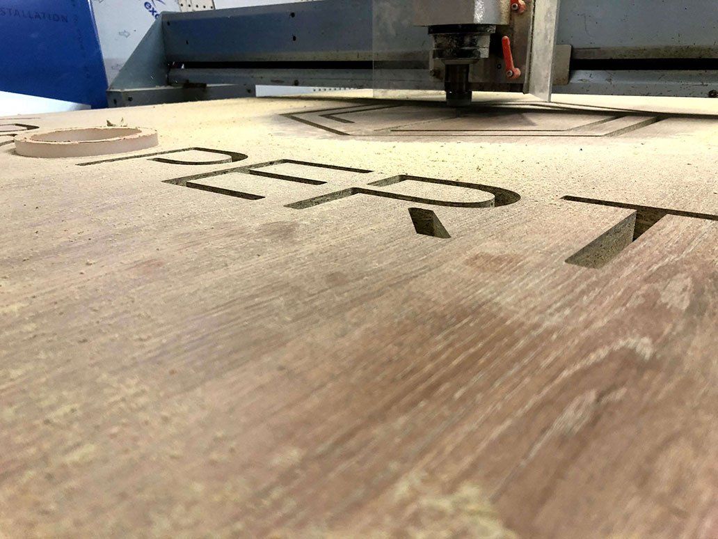 Logo Carvings On Timber — Signage In Acacia Ridge, QLD