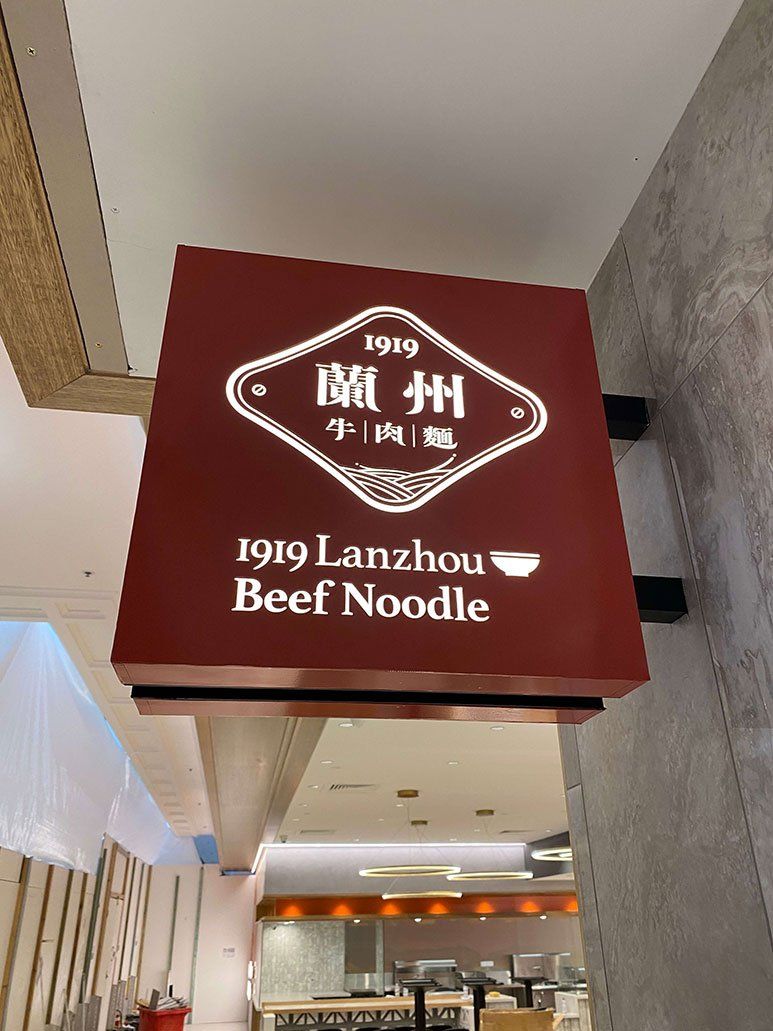 Red Hanging Signage — Signage In Acacia Ridge, QLD