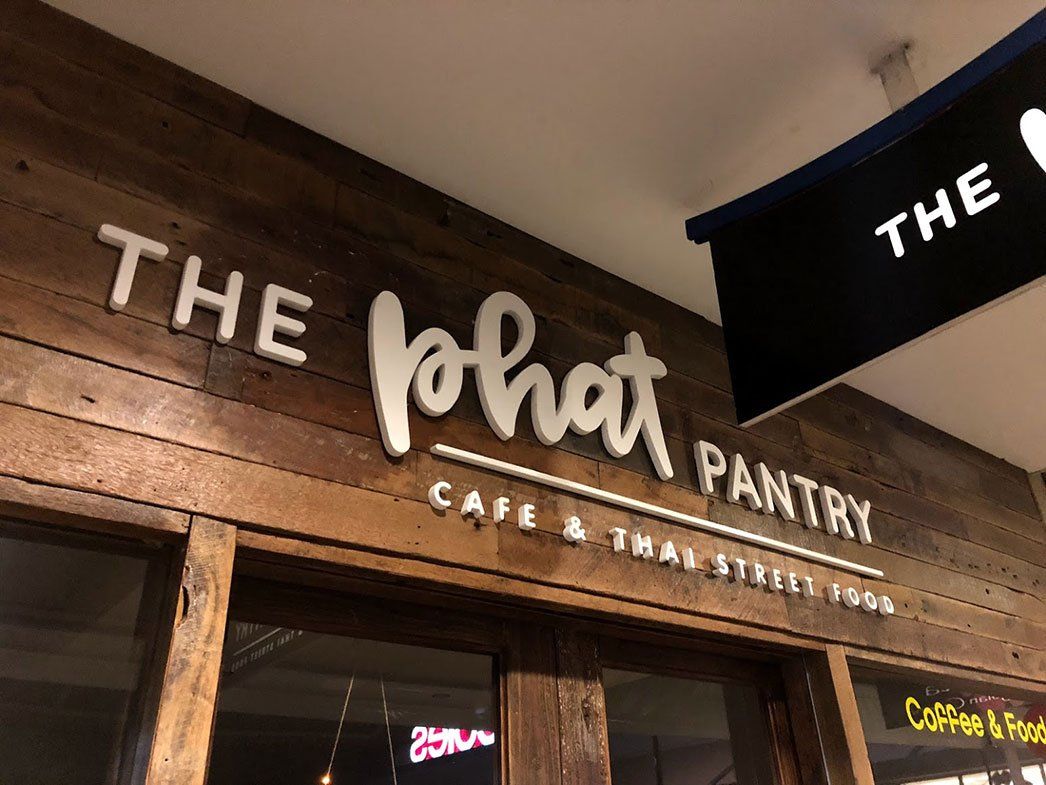 The Phat Pantry Logo On Timber Wall — Signage In Acacia Ridge, QLD