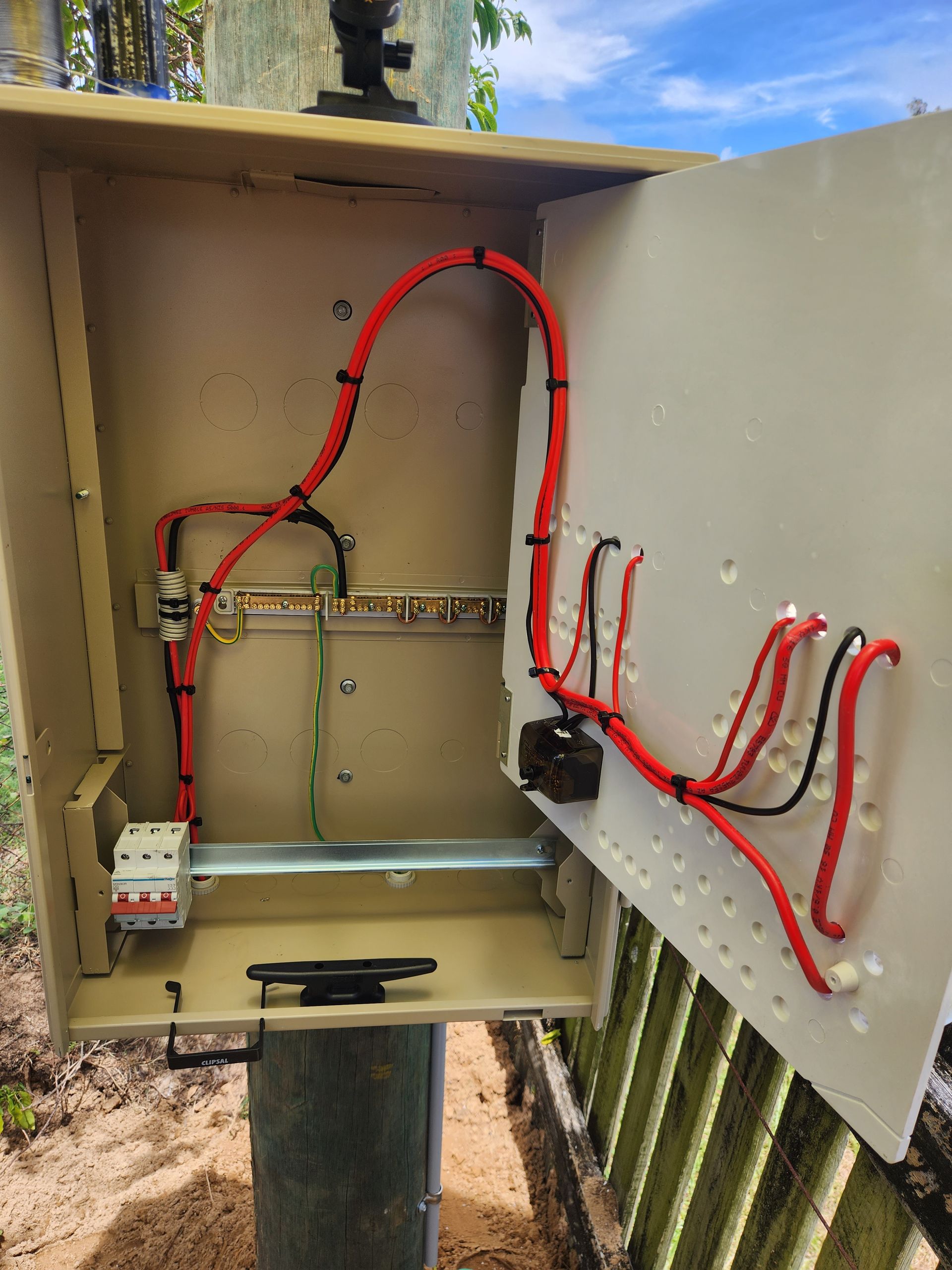 A Post With A Bunch Of Electrical Equipment On It — Prowire Services In Walkerston, QLD