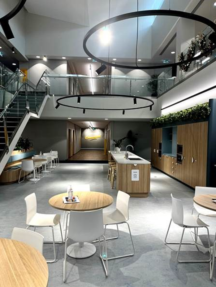 Modern Office Interior With Tables — Perth Electrical & Data in Joondalup, WA