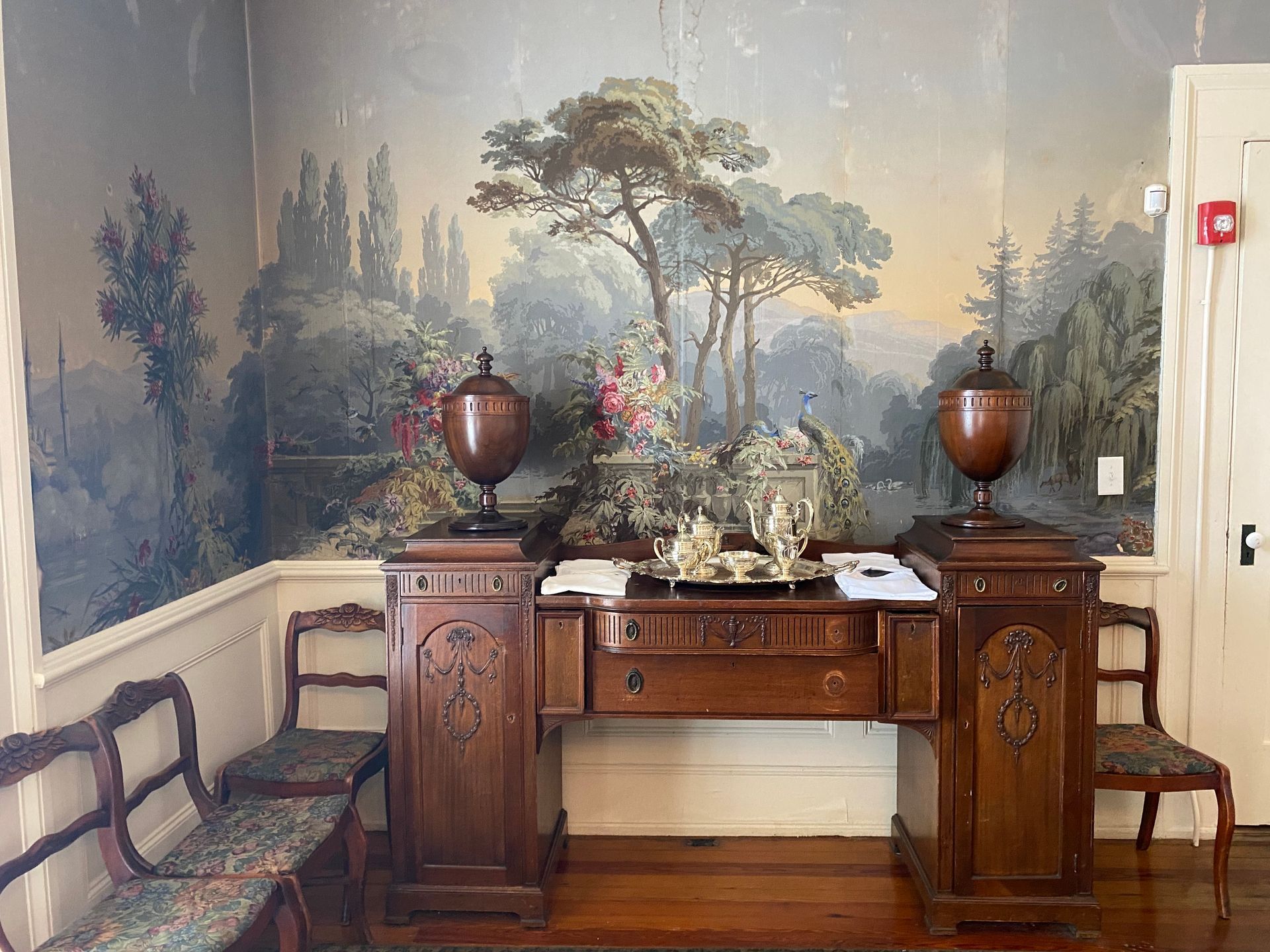 A large room with tables and chairs and a dance floor