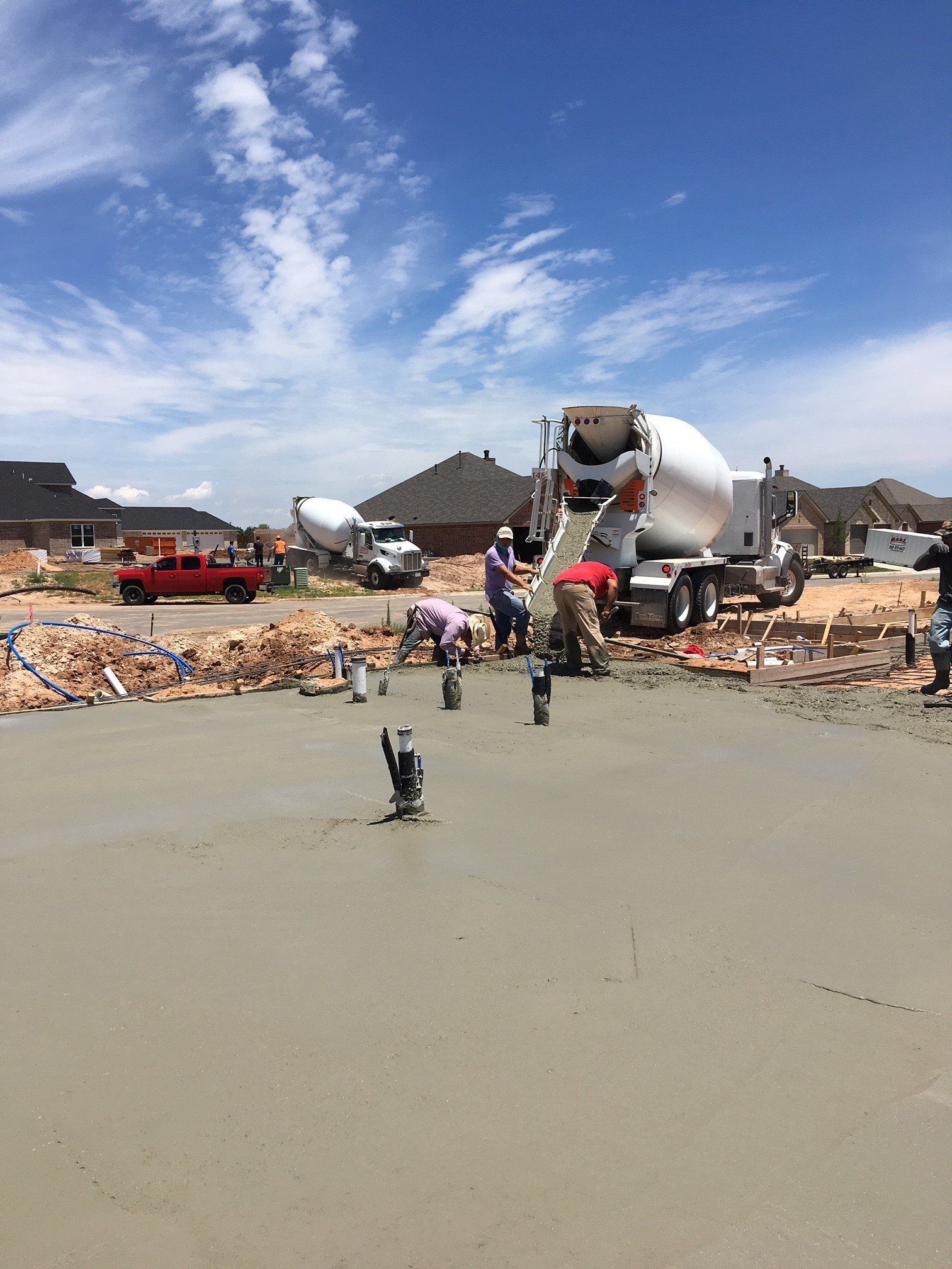 Men Working On Flat Concrete — Amarillo, TX — Thomas RediMix Co Inc