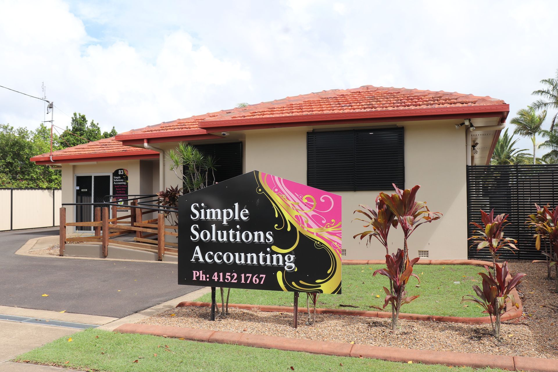 A Building With A Sign Out The Front — Simple Solutions Accounting In Bundaberg West, QLD