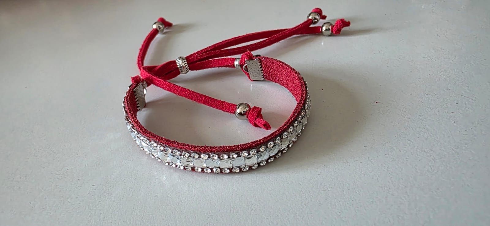 Pulsera roja espejos