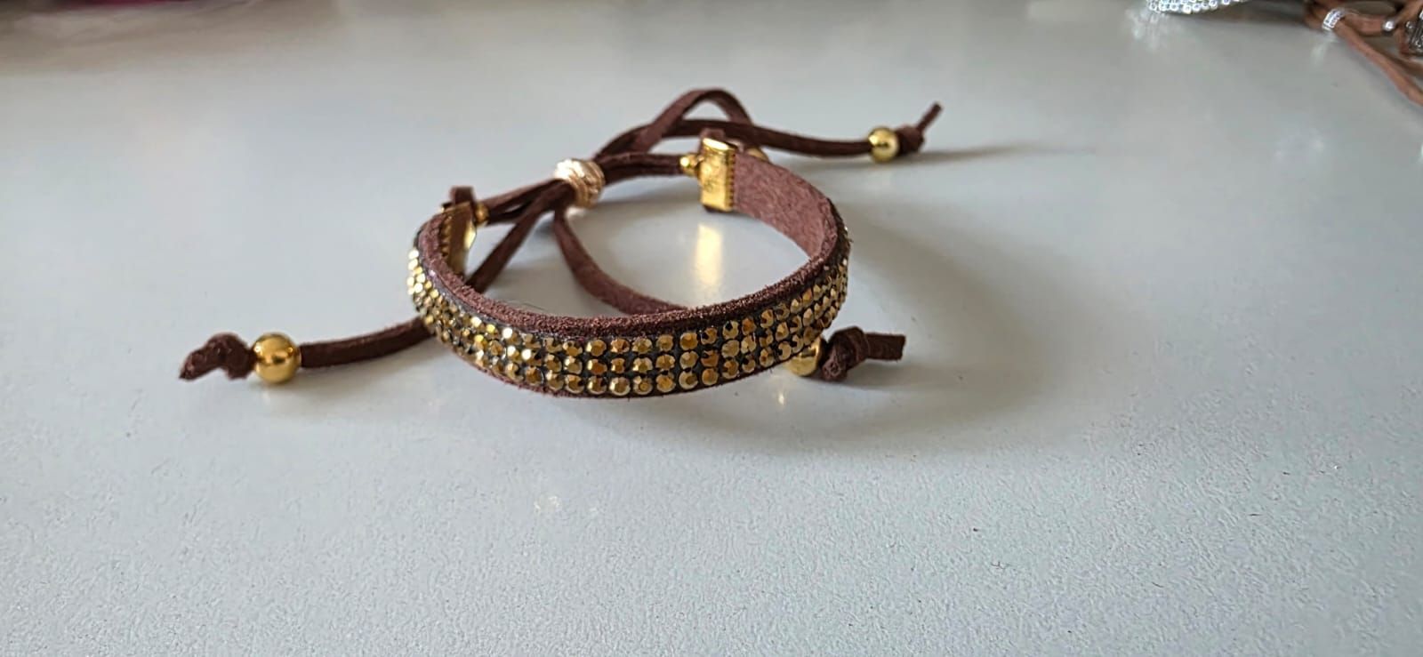 Pulsera chocolate oro