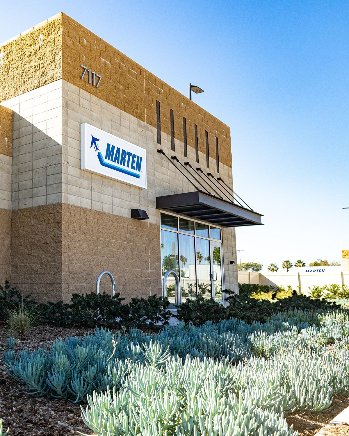 A building with a sign that says marten on it