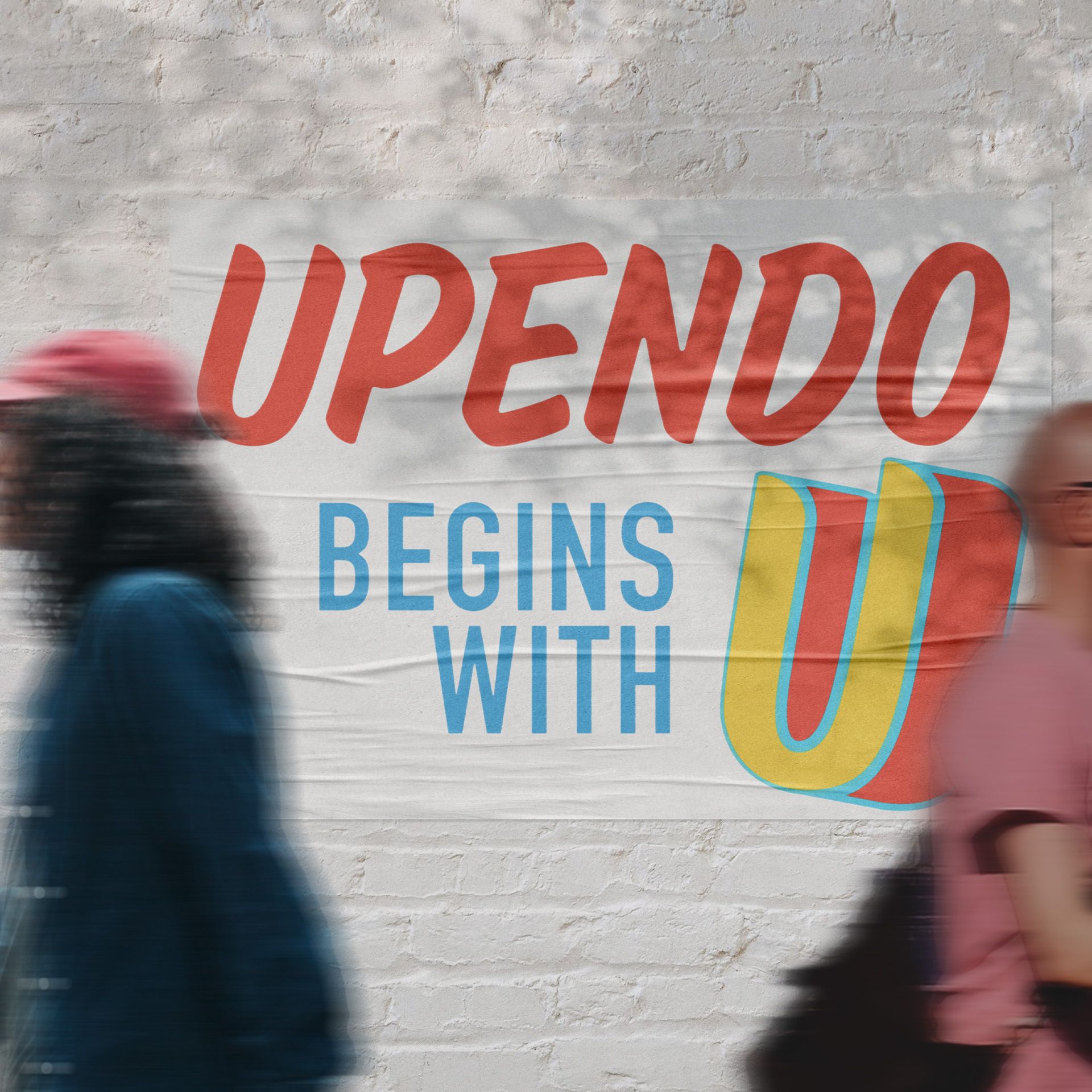 A poster on a wall that says upendo begins with u