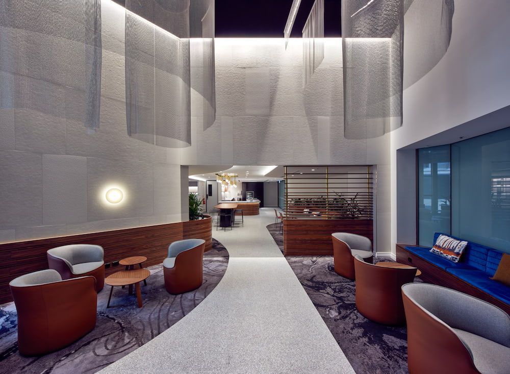 A Lobby With a Lot of Chairs and Tables — Concept Kitchens In Port Macquarie, NSW