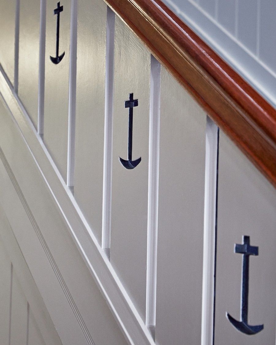 A White Staircase With Anchors Painted On The Railing — Concept Kitchens In Port Macquarie, NSW