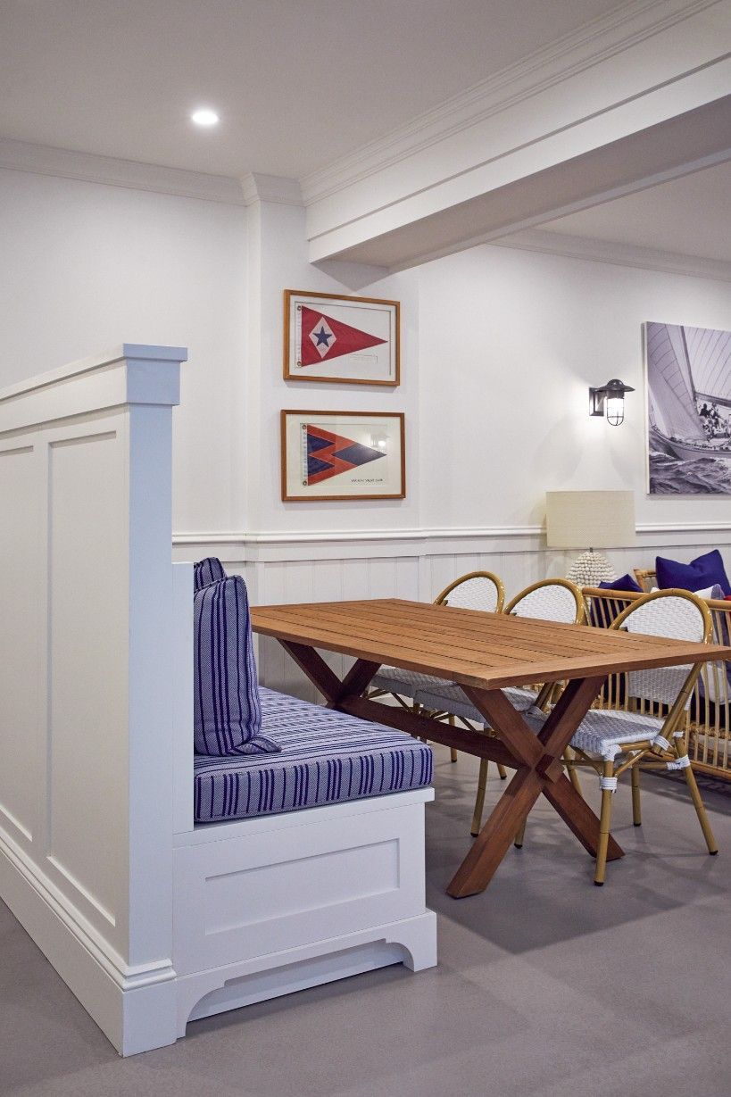 A Dining Room With A White Table And Chairs And A Bench — Concept Kitchens In Port Macquarie, NSW