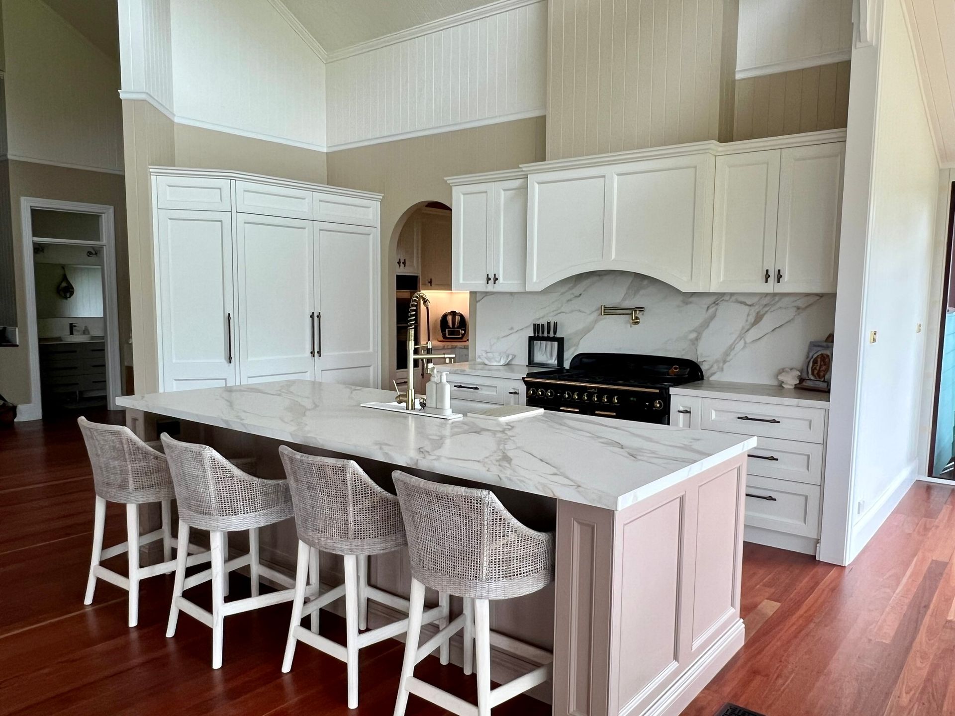 White kitchen with brown timber flooring - Concept Kitchens in Port Macquarie NSW