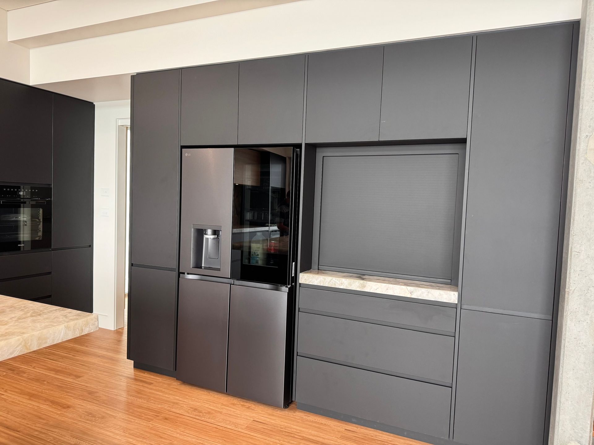 Black slate kitchen cabinets with black fridge - Concept Kitchens in Port Macquarie NSW