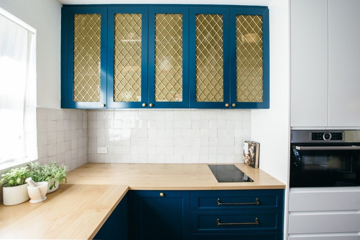 A Kitchen With Blue Cabinets And Wooden White Counter Tops — Concept Kitchens In Port Macquarie, NSW