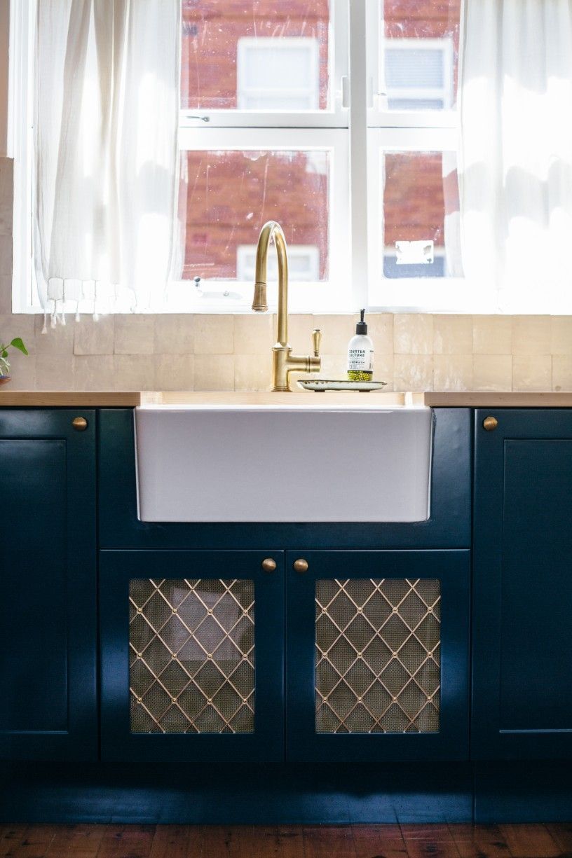 A Kitchen With A White Sink, Cabinets, And A Window — Concept Kitchens In Port Macquarie, NSW