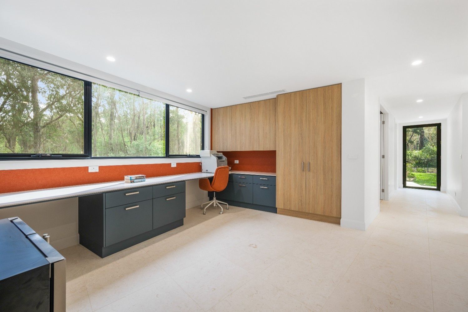 Home Office with Large Windows, Desk, Cabinetry, and Orange Accents — Concept Kitchens In Port Macquarie, NSW