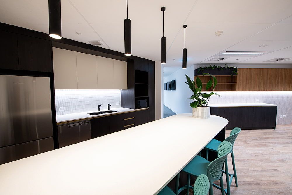 A Sleek Modern Kitchen Featuring a Counter and a Sink — Concept Kitchens In Port Macquarie, NSW