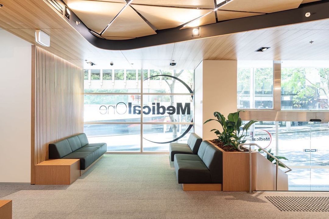 A Waiting Room With A Lot Of Windows And A Sign Outside — Concept Kitchens In Port Macquarie, NSW