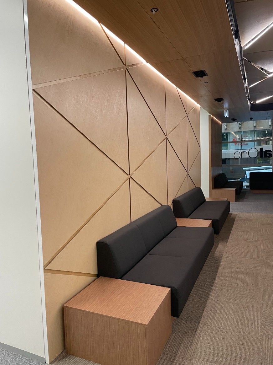 A Brown Waiting Room With A Couch And One Table — Concept Kitchens In Port Macquarie, NSW