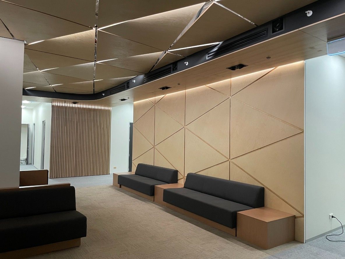 A Waiting Brown Room With A Lot Of Couch's And Tables — Concept Kitchens In Port Macquarie, NSW