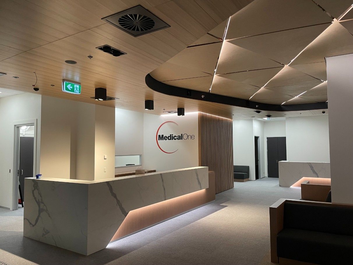 An Aesthetic Hospital Reception Area With A Marble Counter  — Concept Kitchens In Port Macquarie, NSW