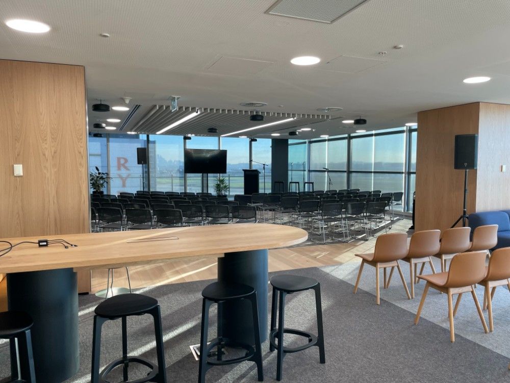 A Large Room With A Table And Chairs In It — Concept Kitchens In Port Macquarie, NSW