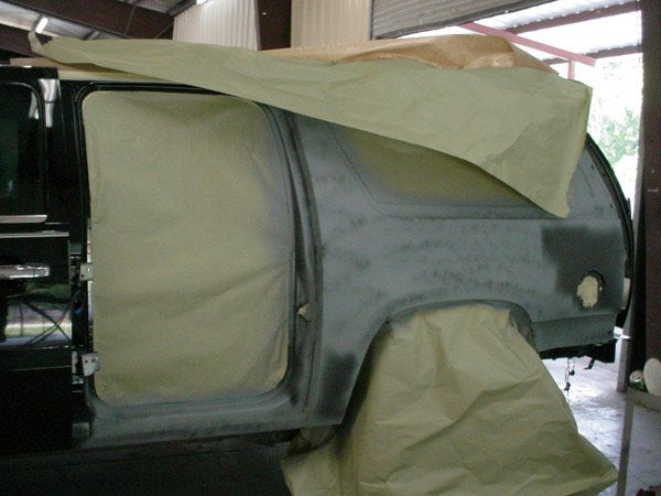 Car body repair with masking paper.