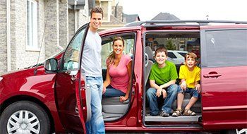 A happy family in a car