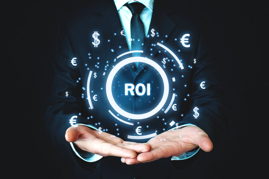 A man in a suit and tie is holding a circle with the word roi in it.