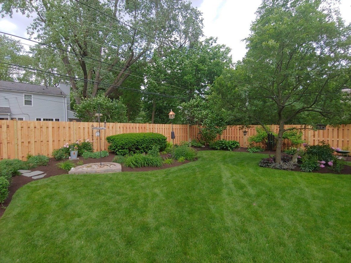 Landscape Around Wooden Fenced Backyard - Columbus, OH - Christal Clean Landscapes