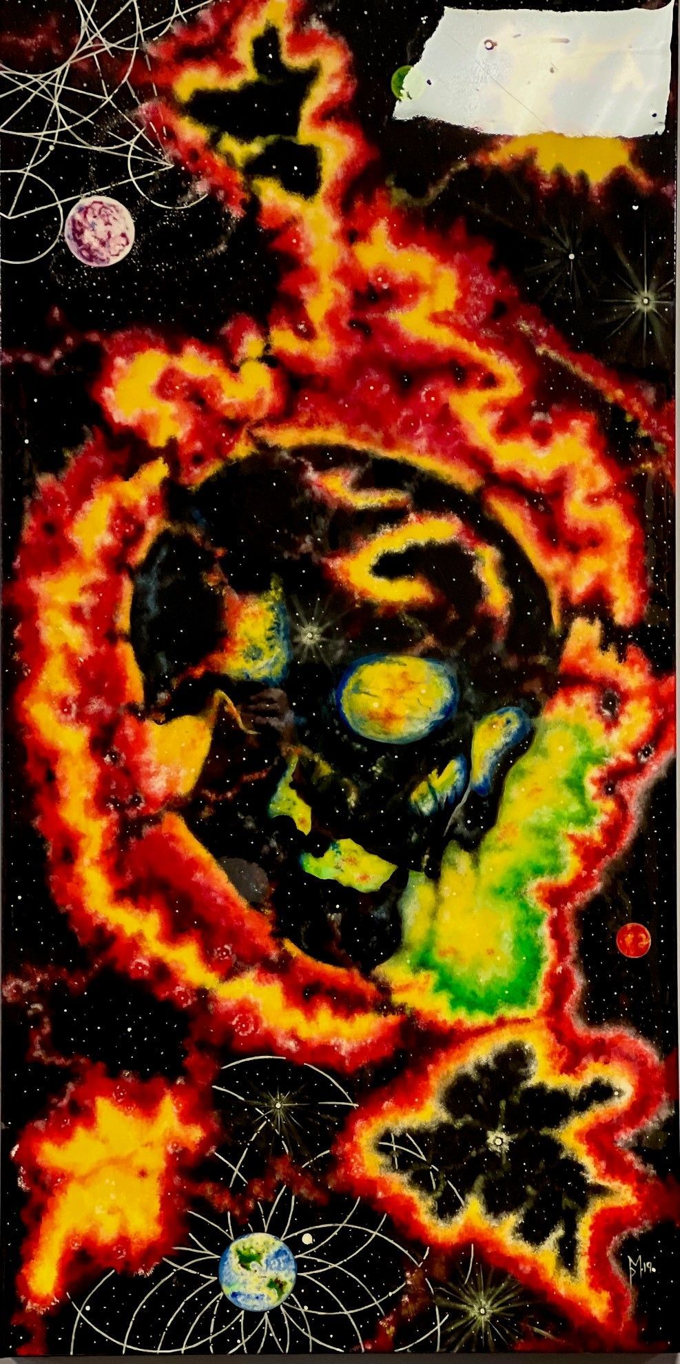 A painting of a skull in the middle of a fireball in space.