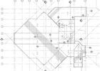 Architectural floor plan with geometric shapes, grid lines, and notations.