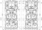 Architectural floor plan of a multi-unit building, showing room layouts, doors, and stairs in black and white.