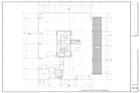 Architectural blueprint plan of a building layout with various rooms and dimensions.
