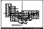 Floor plan of a building with multiple rooms and corridors. Rectangular layout with detailed internal structure.