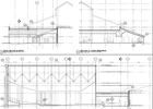 Architectural blueprints with elevations and a plan view of a building's structure.