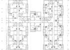 Architectural floor plan of a multi-unit building; shows rooms, walls, doors, and walkways.