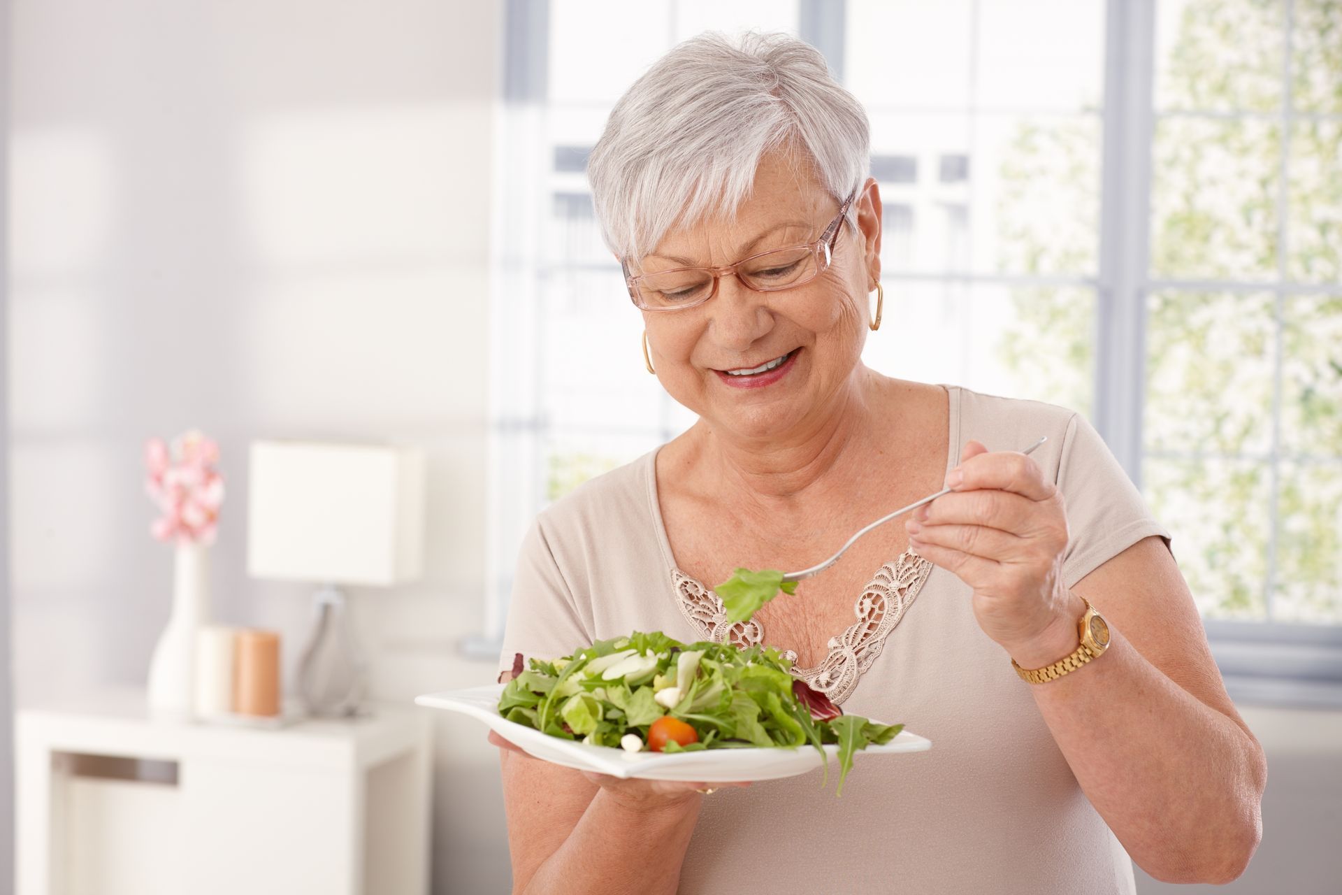 Lady eating a salad