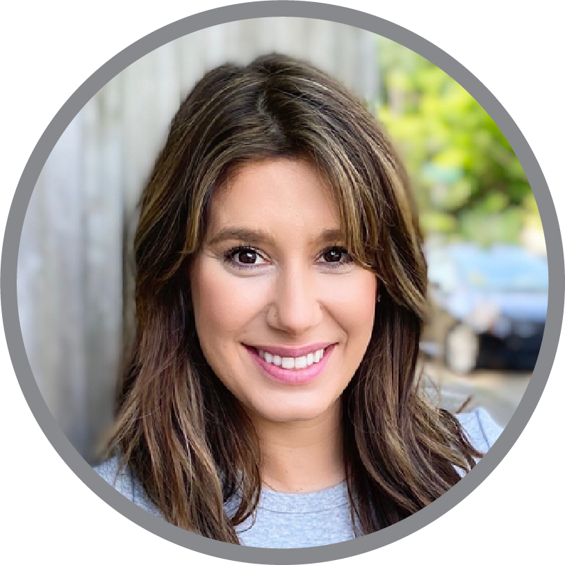 A woman with long brown hair is smiling in a circle.