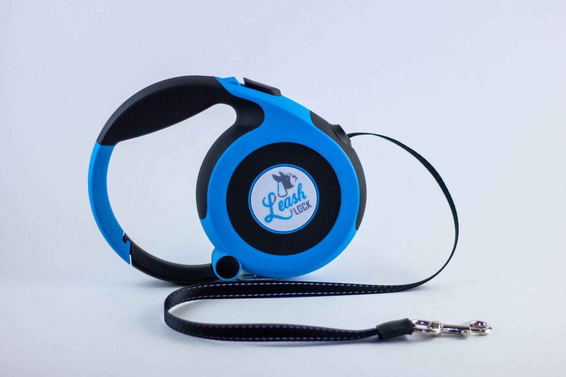 A blue and black leash with the word lead on it