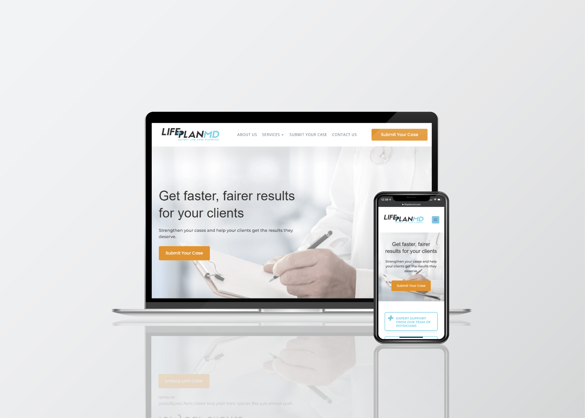 A laptop and a cell phone are sitting next to each other on a table.