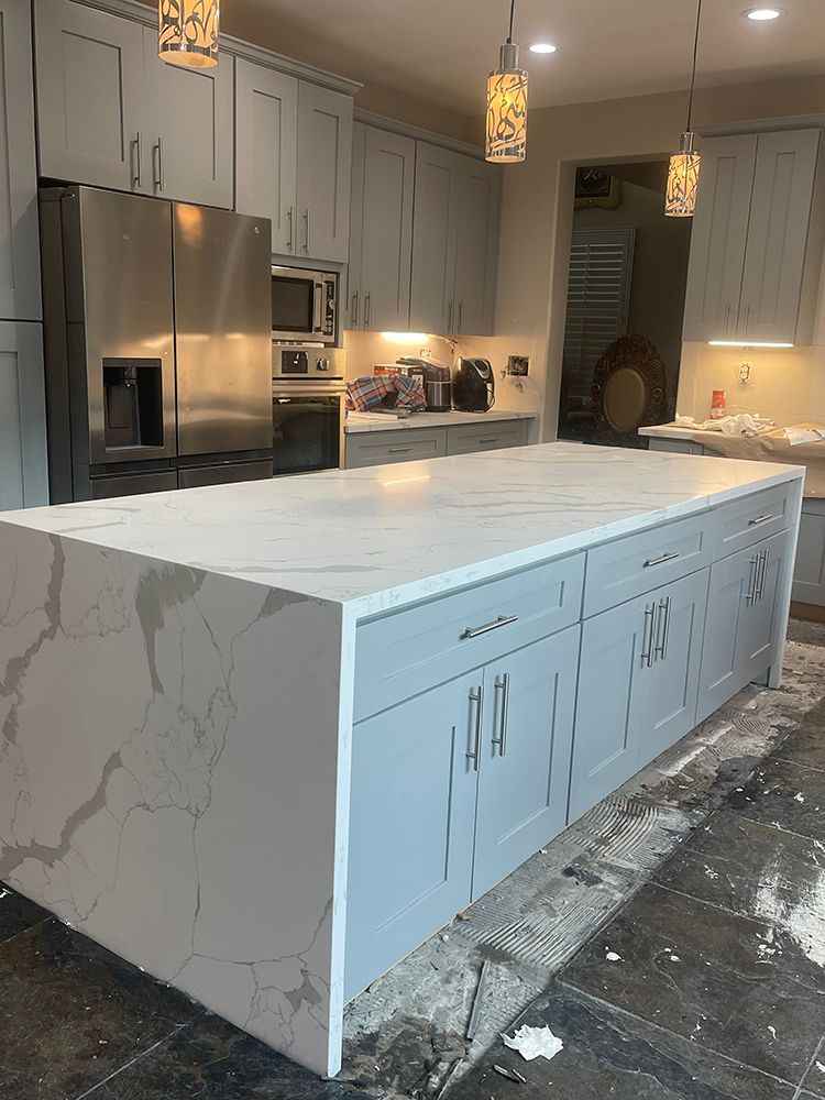 Contemporary kitchen cabinet installation with island