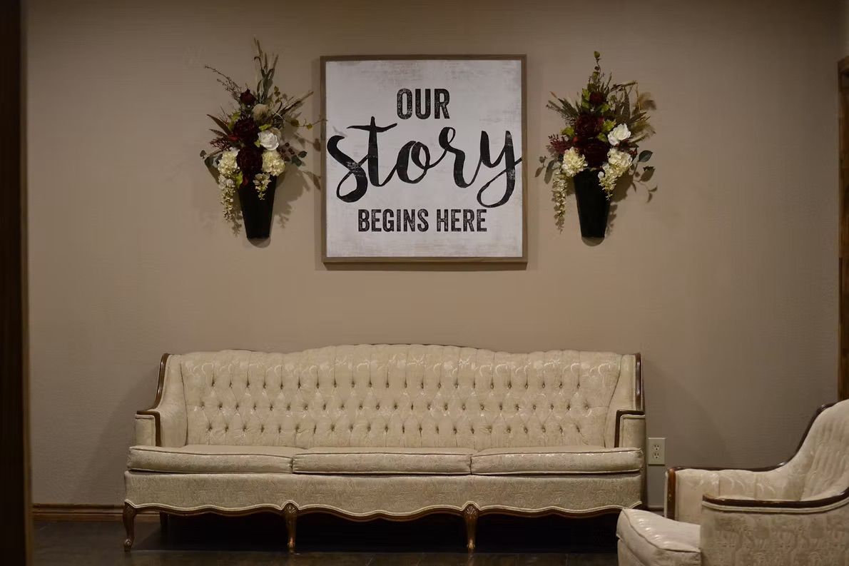 Cream sofa and chair beneath 