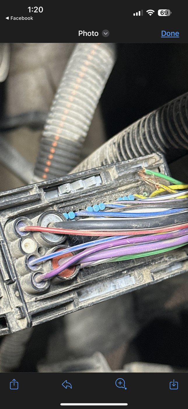 A close up of a bunch of wires on a phone.