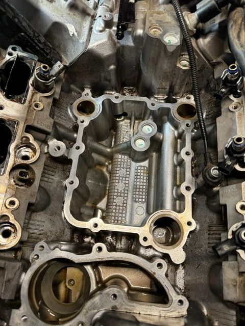 A close up of the inside of a car engine.