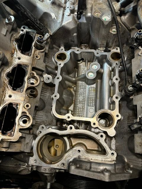 A close up of the inside of a car engine.