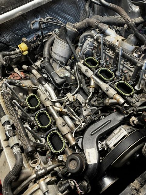 A close up of the engine of a car
