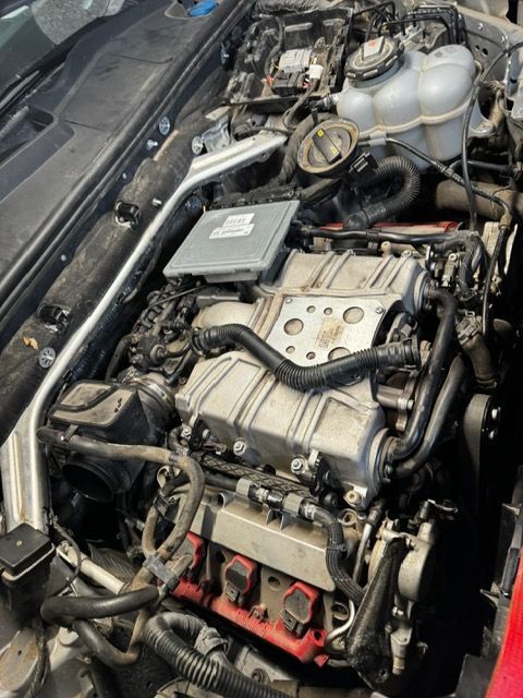 A close up of the engine of a car